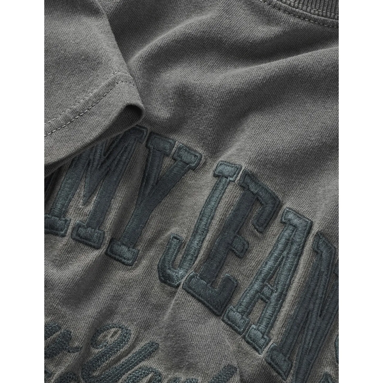 TJM REG VINTAGE VARSITY TEE